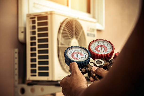 Professional Hvac technician working in Burlington, ND